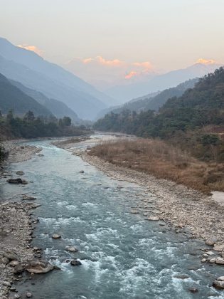 Budhi Gandaki Valley landscape with the Budhi Gandaki River flowing through the Himalayan hills of the Manaslu region in Nepal.